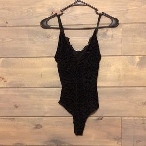 Black velvet bodysuit